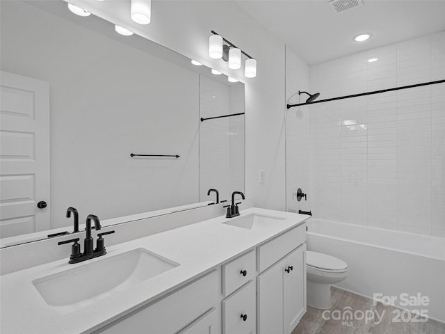 8315 Adrian Ct, Charlotte, NC 28270 - bathroom with double vanity, tub / shower combination, recessed lighting, and wood finished floors