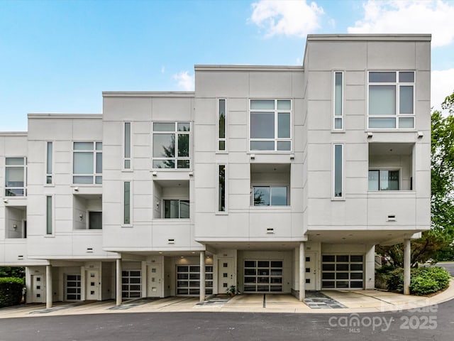 314 Viburnum Way Ct, Charlotte, NC 28208 - view of apartment building / complex featuring a garage