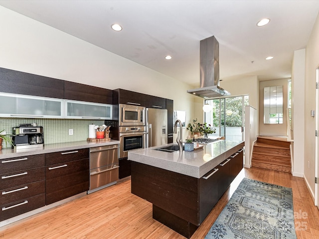 314 Viburnum Way Ct, Charlotte, NC 28208 - kitchen with stainless steel appliances, island exhaust hood, modern cabinets, a sink, and an island with sink