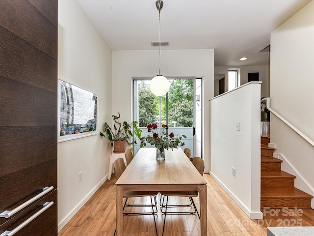 314 Viburnum Way Ct, Charlotte, NC 28208 - dining room featuring light wood-style floors, baseboards, stairs, and recessed lighting