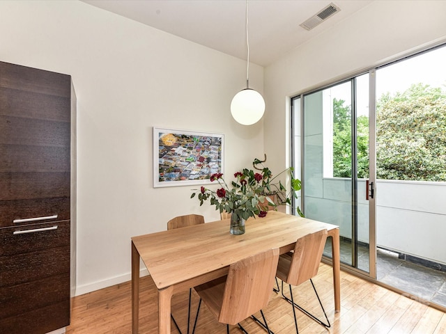 314 Viburnum Way Ct, Charlotte, NC 28208 - dining area with light wood-style floors and baseboards