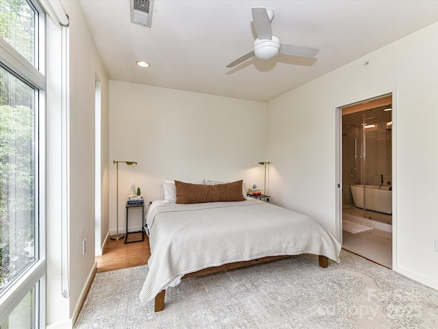314 Viburnum Way Ct, Charlotte, NC 28208 - bedroom with recessed lighting, light wood-style floors, baseboards, connected bathroom, and a ceiling fan