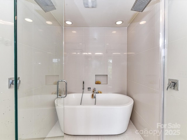 314 Viburnum Way Ct, Charlotte, NC 28208 - full bath featuring a shower stall, tile walls, a freestanding tub, recessed lighting, and tile patterned flooring