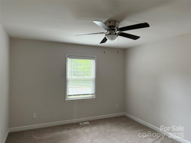 2015 Downey St, Rock Hill, SC 29732 - spare room featuring light colored carpet, baseboards, and ceiling fan