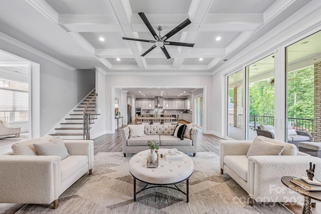 1702 Batson Creek Ln, Weddington, NC 28104 - living area featuring stairway, light wood-type flooring, coffered ceiling, a ceiling fan, and beamed ceiling