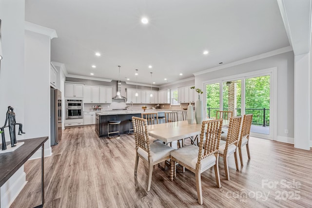 1702 Batson Creek Ln, Weddington, NC 28104 - dining space with ornamental molding, recessed lighting, and light wood-style floors