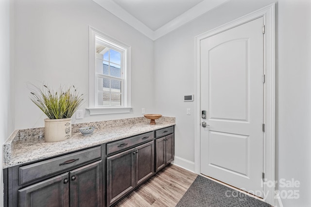 1702 Batson Creek Ln, Weddington, NC 28104 - doorway featuring light wood-type flooring and baseboards
