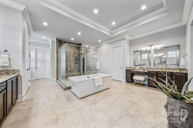1702 Batson Creek Ln, Weddington, NC 28104 - bathroom with crown molding, a shower stall, vanity, a freestanding bath, and recessed lighting