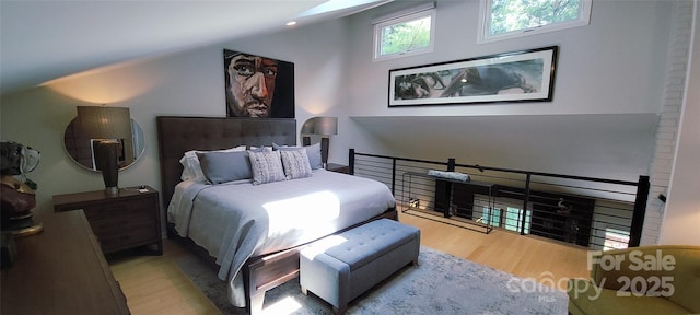 308 Woodfield Dr, Asheville, NC 28803 - bedroom featuring wood finished floors and lofted ceiling