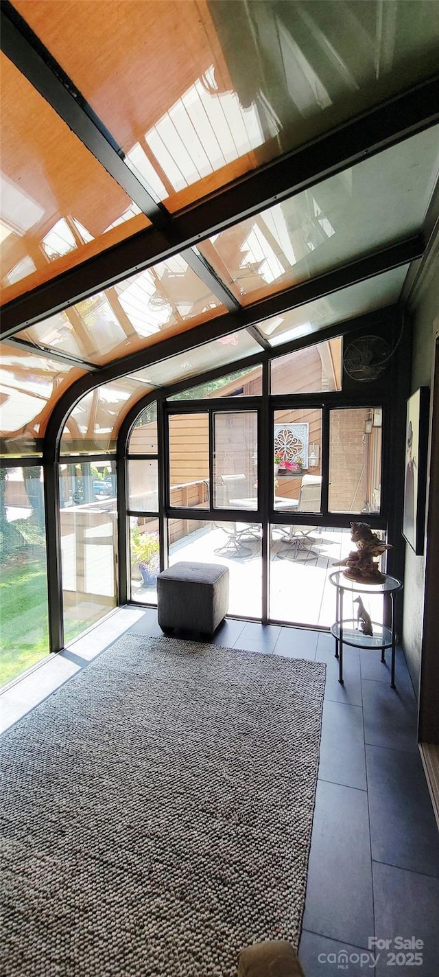 308 Woodfield Dr, Asheville, NC 28803 - unfurnished sunroom with lofted ceiling