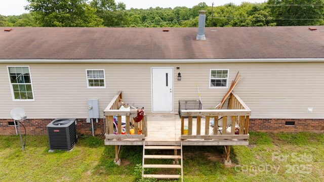 1007 W Cabaniss Rd, Shelby, NC 28150 - rear view of house with crawl space, central AC, a deck, and a lawn