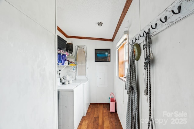 1007 W Cabaniss Rd, Shelby, NC 28150 - laundry room with ornamental molding, wood finished floors, washing machine and dryer, a textured ceiling, and electric panel