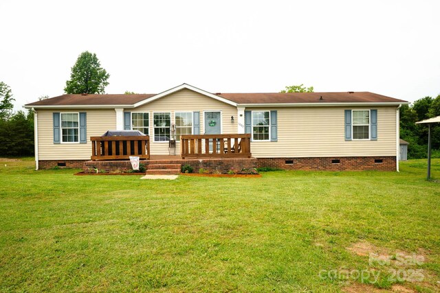 1007 W Cabaniss Rd, Shelby, NC 28150 - rear view of property featuring crawl space, a wooden deck, and a lawn