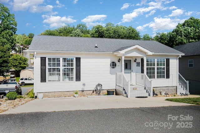 161 Badin Lake Cir, New London, NC 28127 - view of front of home featuring roof with shingles