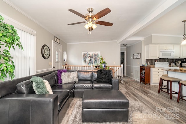 161 Badin Lake Cir, New London, NC 28127 - living room with light wood-style flooring, a ceiling fan, and crown molding