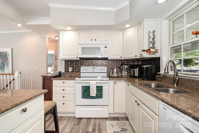 161 Badin Lake Cir, New London, NC 28127 - kitchen featuring white appliances, a sink, white cabinets, crown molding, and light wood finished floors