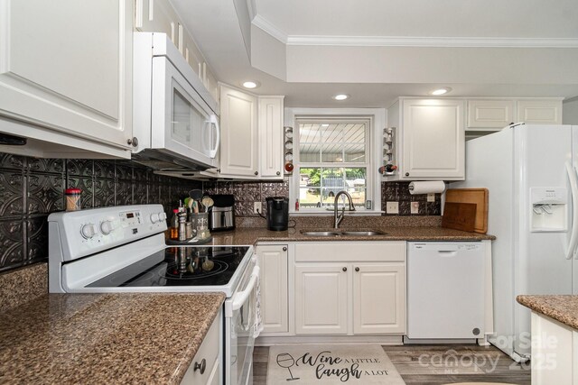 161 Badin Lake Cir, New London, NC 28127 - kitchen with white appliances, a sink, crown molding, white cabinetry, and backsplash