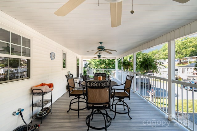 161 Badin Lake Cir, New London, NC 28127 - deck with a ceiling fan and outdoor dining area