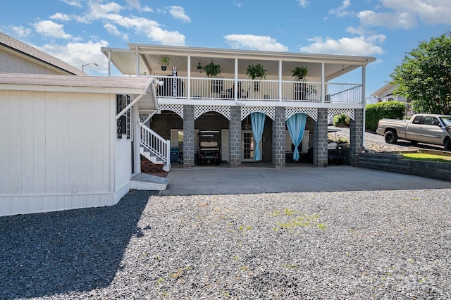 161 Badin Lake Cir, New London, NC 28127 - view of front facade featuring stairway and concrete driveway