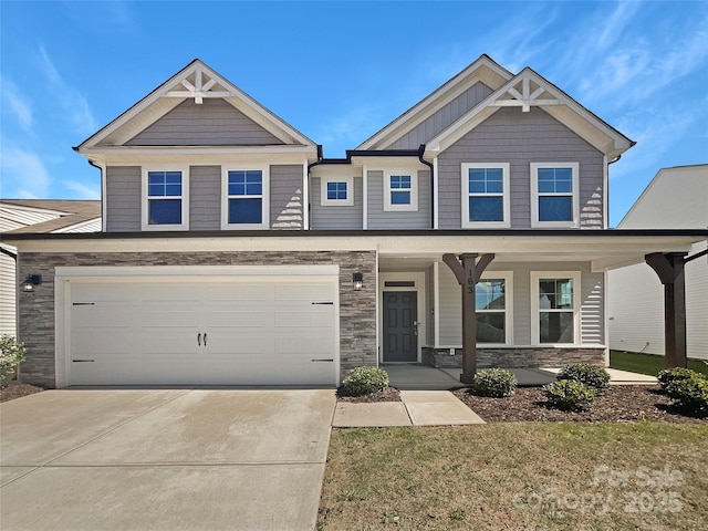 163 W Heart Pine Ln, Statesville, NC 28677 - view of front of house featuring a porch, concrete driveway, stone siding, and a garage