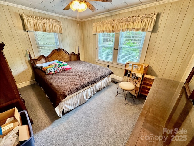1733 S NC-16 Business Hwy, Stanley, NC 28164 - carpeted bedroom featuring wooden walls, crown molding, baseboards, and a ceiling fan