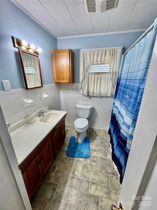 1733 S NC-16 Business Hwy, Stanley, NC 28164 - bathroom with toilet, vanity, tile walls, ornamental molding, and a shower with curtain
