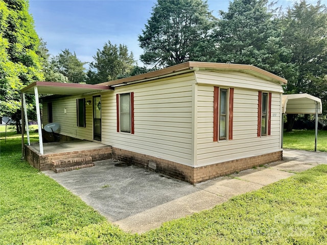 1733 S NC-16 Business Hwy, Stanley, NC 28164 - view of home's exterior featuring a lawn