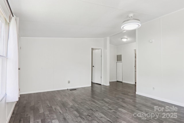 85 Star Flower Rd, Alexander, NC 28701 - unfurnished room featuring wood finished floors, lofted ceiling, and baseboards