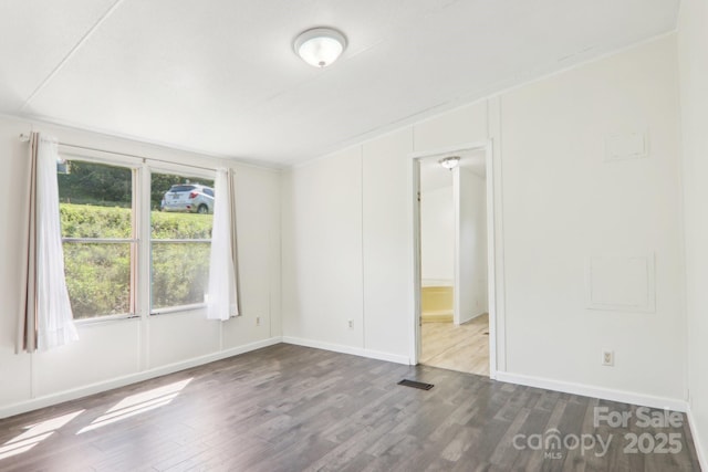85 Star Flower Rd, Alexander, NC 28701 - spare room with wood finished floors and baseboards