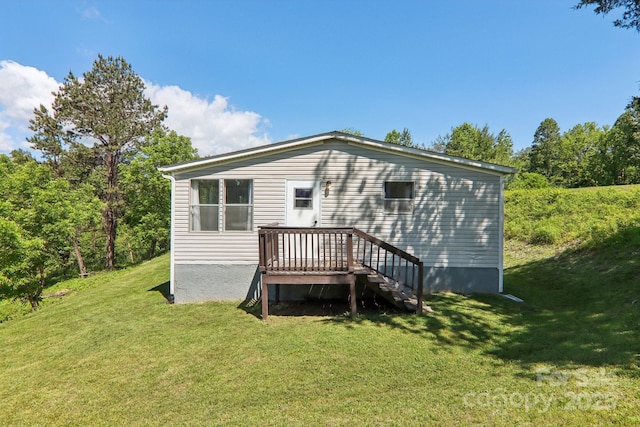85 Star Flower Rd, Alexander, NC 28701 - back of house featuring a yard