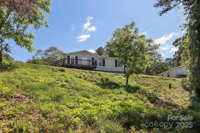 85 Star Flower Rd, Alexander, NC 28701 - rear view of house featuring a wooden deck