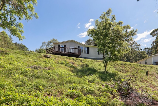 85 Star Flower Rd, Alexander, NC 28701 - back of house with a deck