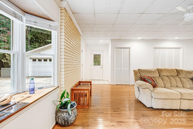 38 Westridge Dr, Asheville, NC 28803 - living area featuring ornamental molding and light wood-style floors