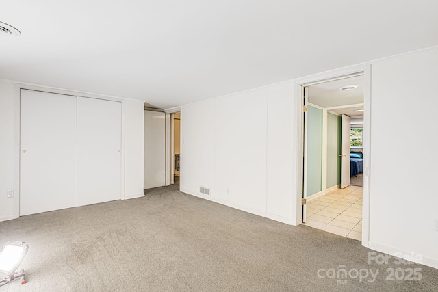 38 Westridge Dr, Asheville, NC 28803 - unfurnished bedroom featuring carpet floors and a closet
