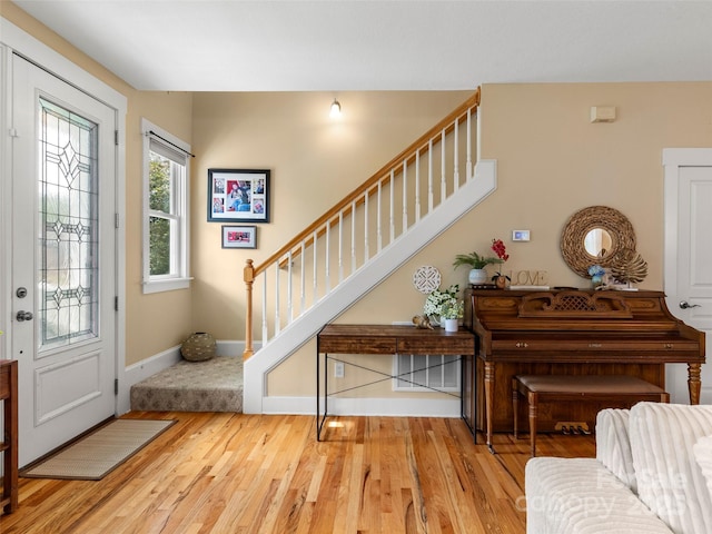 7 Oakhaven Ter, Asheville, NC 28803 - entrance foyer featuring stairway, wood finished floors, and baseboards