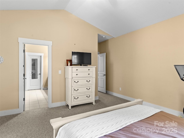 7 Oakhaven Ter, Asheville, NC 28803 - bedroom featuring lofted ceiling, light carpet, baseboards, and light tile patterned floors