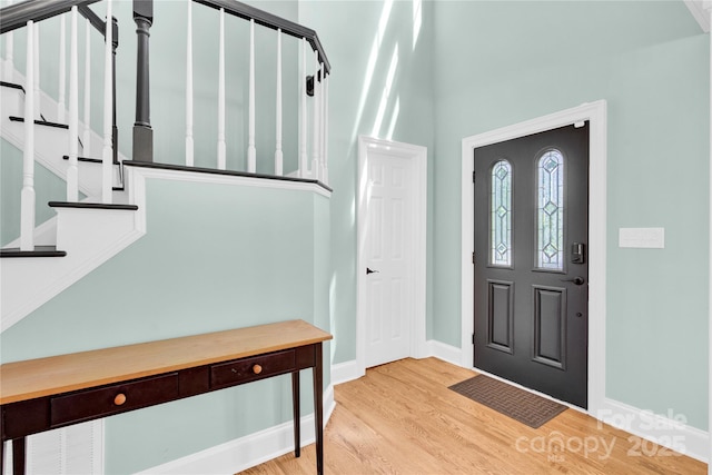832 Kemp Rd, Mooresville, NC 28117 - foyer featuring wood finished floors and stairway