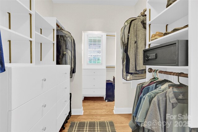832 Kemp Rd, Mooresville, NC 28117 - walk in closet featuring wood finished floors
