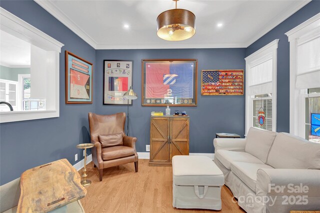 832 Kemp Rd, Mooresville, NC 28117 - sitting room featuring wood finished floors, ornamental molding, and recessed lighting