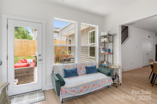 212 Rockrose Ct, Asheville, NC 28803 - sitting room with wood finished floors and baseboards