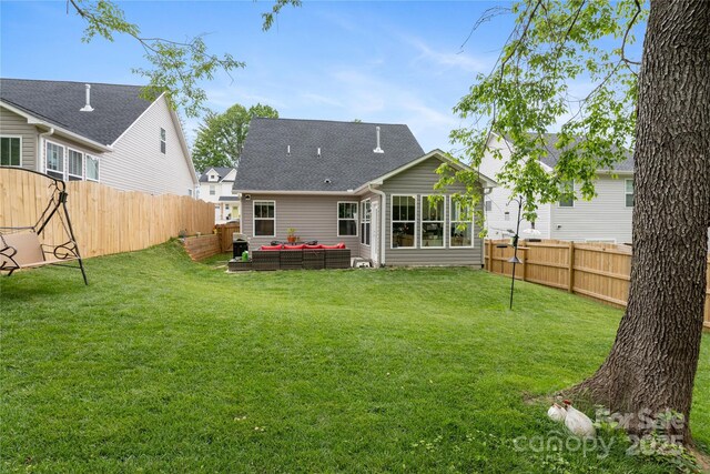 212 Rockrose Ct, Asheville, NC 28803 - rear view of house with an outdoor living space and roof with shingles