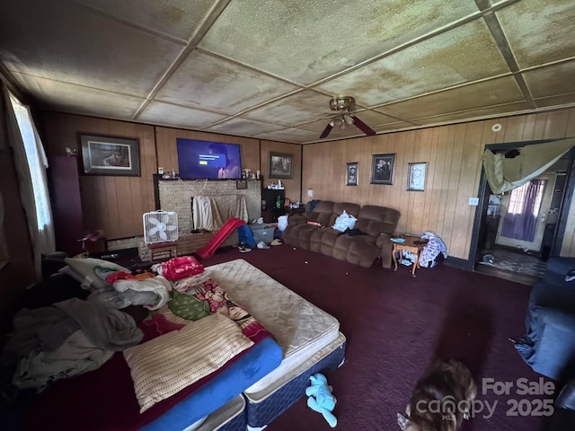 764 S Battleground Ave, Grover, NC 28073 - carpeted dining room featuring wood walls and ceiling fan