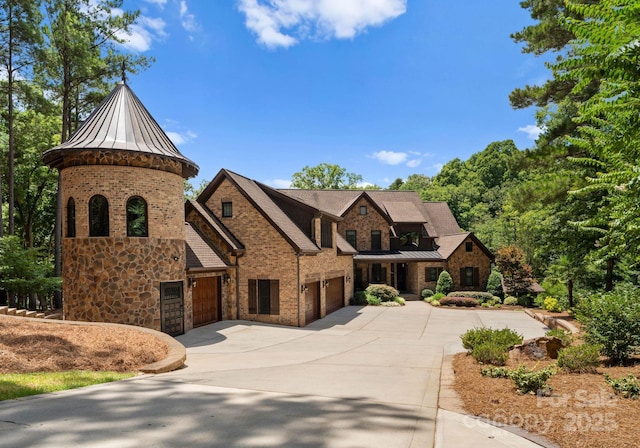 1220 Broadside Rd, York, SC 29745 - view of front of home featuring a standing seam roof, stone siding, driveway, and metal roof