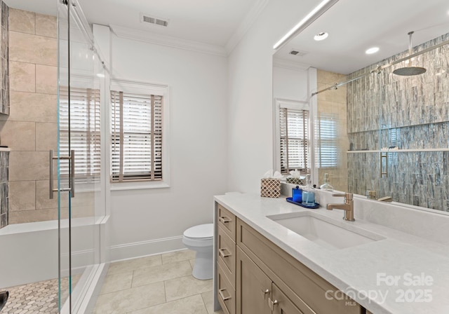 1220 Broadside Rd, York, SC 29745 - bathroom featuring plenty of natural light, vanity, a stall shower, ornamental molding, and toilet