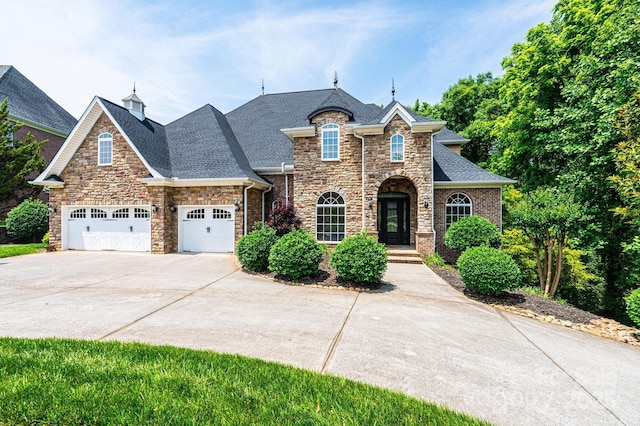 4431 1st Street Dr NW, Hickory, NC 28601 - french country home with concrete driveway, roof with shingles, stone siding, and a garage