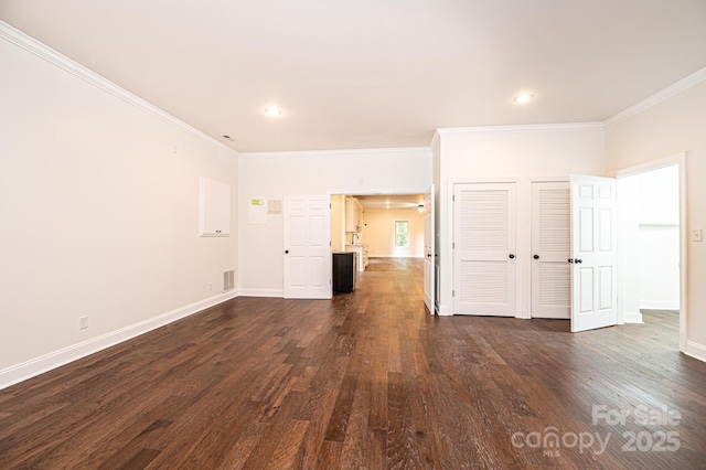 4431 1st Street Dr NW, Hickory, NC 28601 - unfurnished living room with crown molding, dark wood-type flooring, baseboards, and recessed lighting