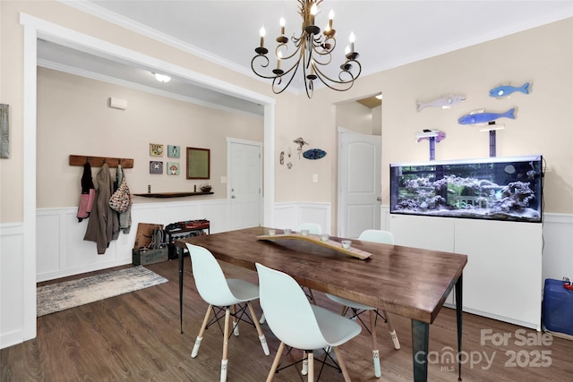 2210 Winding River Dr, Charlotte, NC 28214 - dining area with wood finished floors, wainscoting, a chandelier, crown molding, and a decorative wall