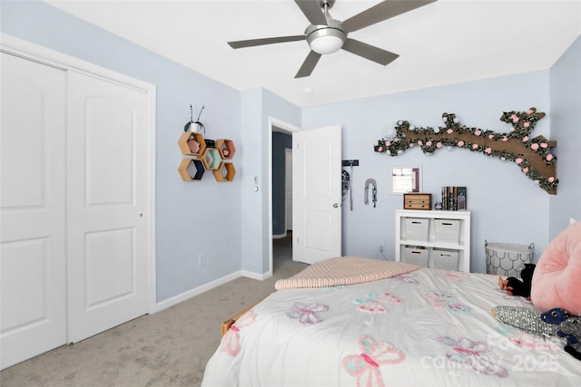 2210 Winding River Dr, Charlotte, NC 28214 - bedroom featuring carpet, ceiling fan, baseboards, and a closet