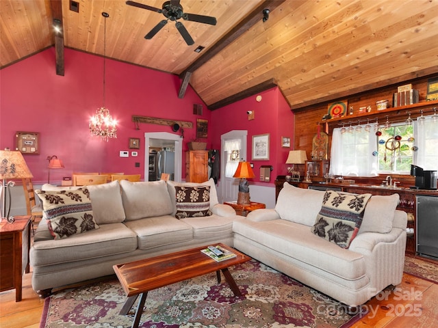 229 Crabtree Mountain Rd, Canton, NC 28716 - living area with light wood-style floors, wood ceiling, a ceiling fan, and a chandelier