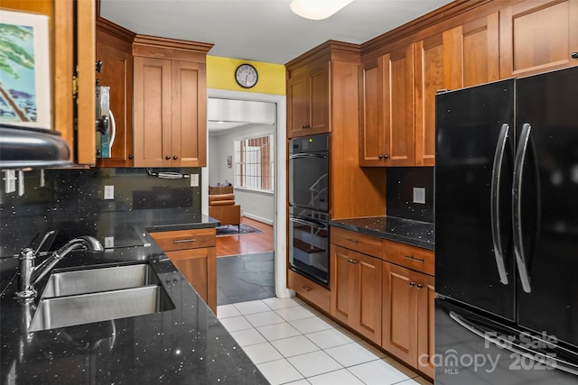 34 Westridge Dr, Asheville, NC 28803 - kitchen featuring black appliances, a sink, decorative backsplash, brown cabinets, and light tile patterned flooring